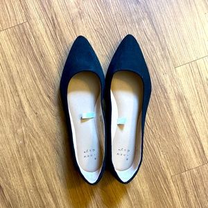 Black suede flats. 7.5W